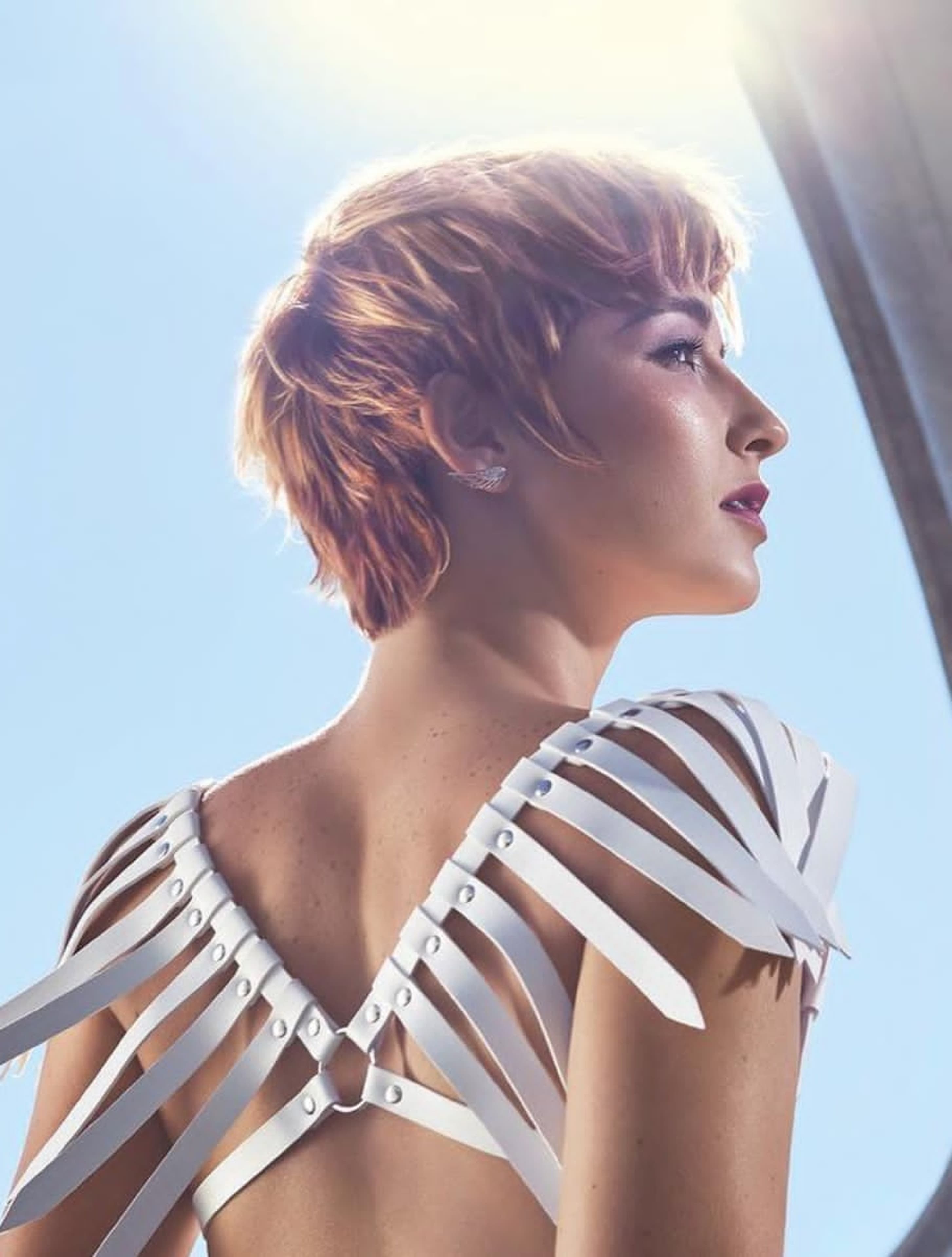 Sun-lit copper pixie cut